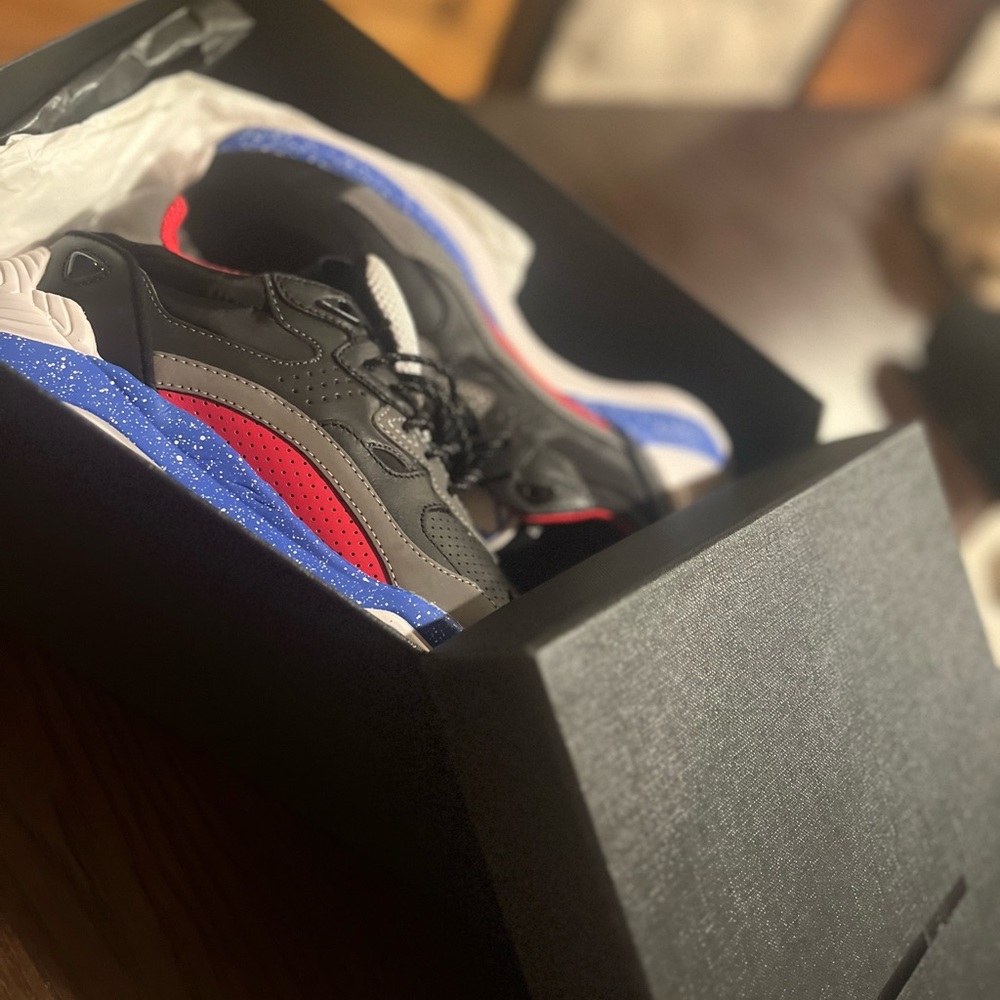 Black and Red Sneakers with Blue Accents